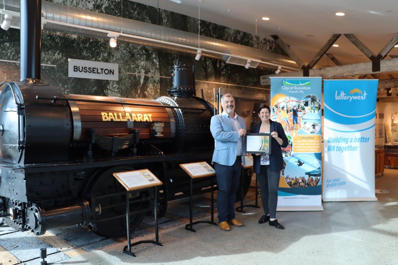 Mayor Grant Henley and Jackie Jarvis MLC standing in front of the Ballaarat steam engine display.